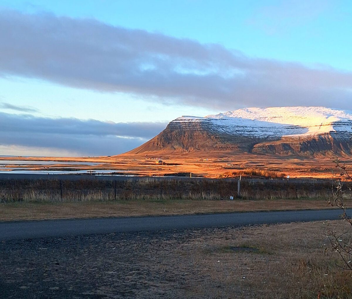 mountain half covered with snow