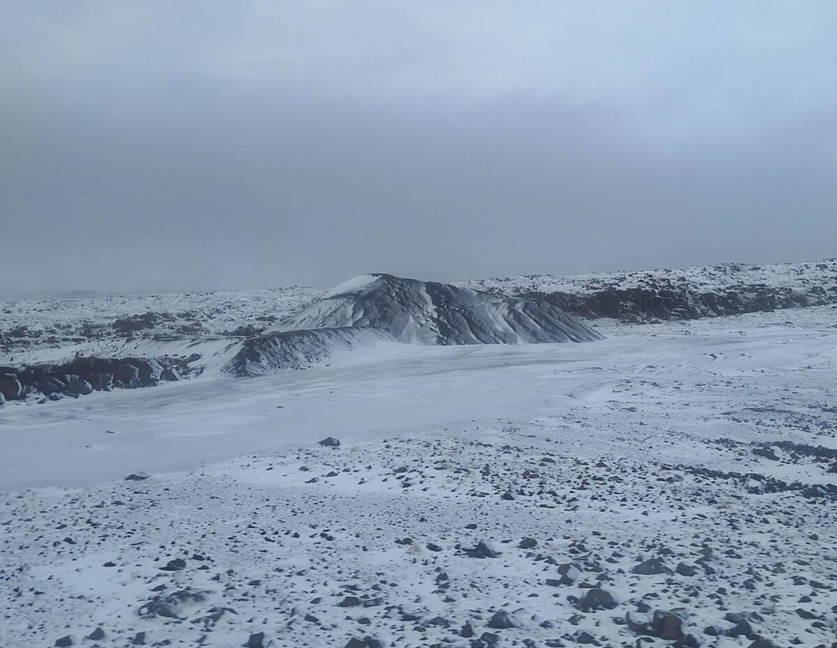 volcanic ash covered in snow in west fjords iceland