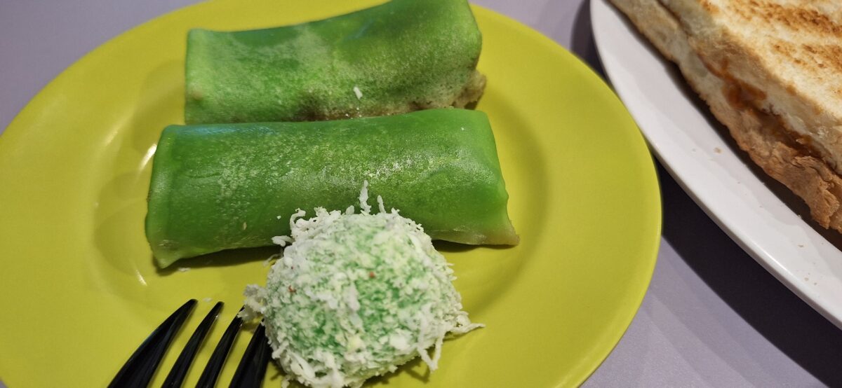 green crepes with coconut filling