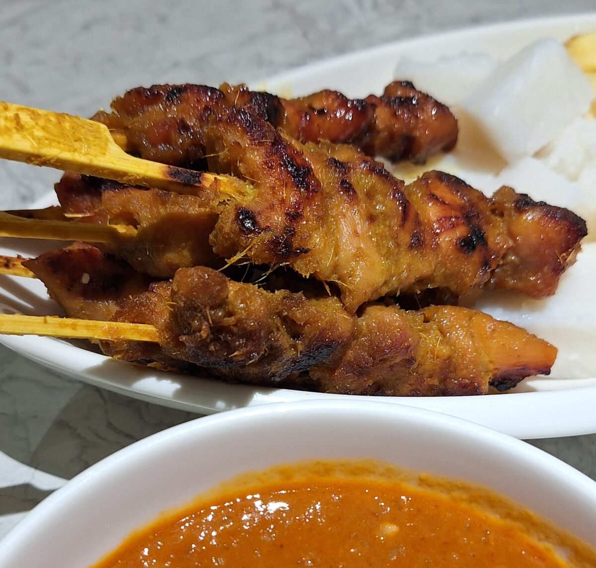 chicken satay, one of the most popular malaysian dishes